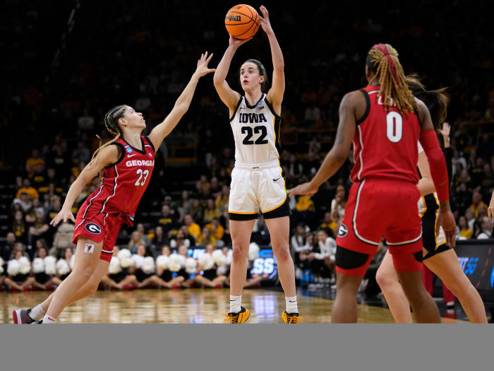 Iowa guard Caitlin Clark shoots over Georgia guard Alisha Lewis in the second round of the NCAA women’s tournament.